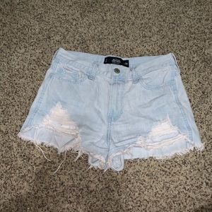 high rise light wash ripped denim shorts